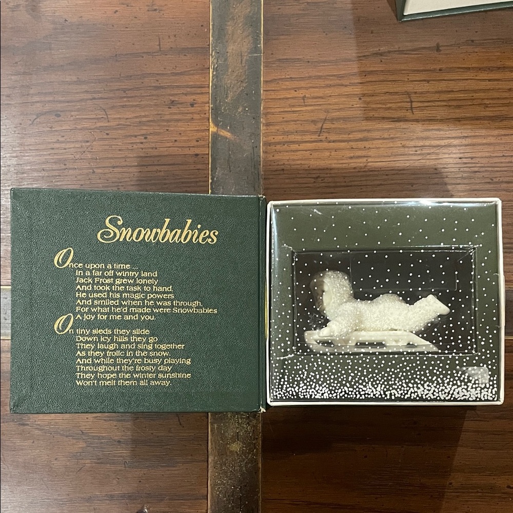Department 56 Snowbabies - Hold on tight